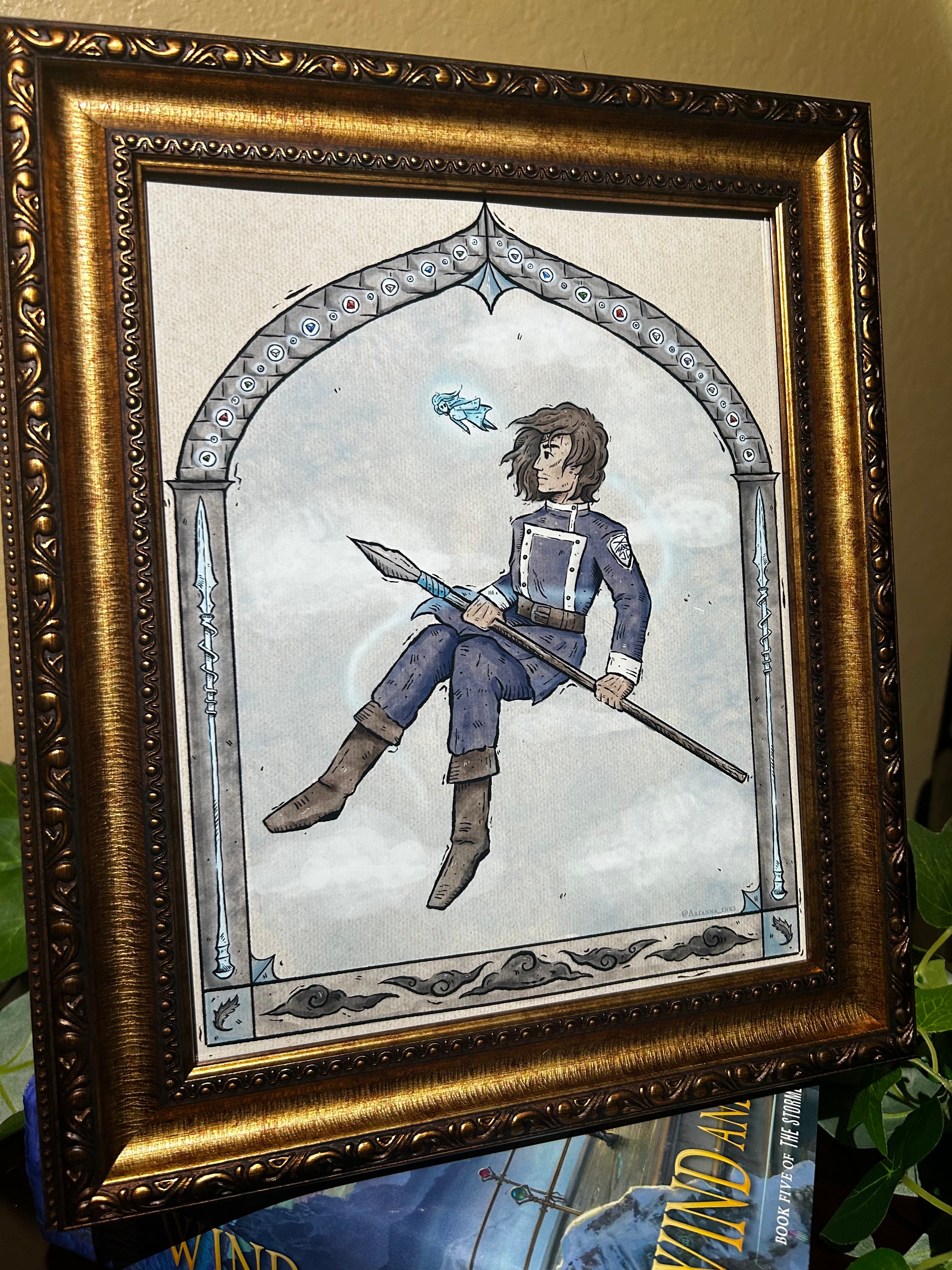 Framed artwork of a character holding a spear with a decorative gold frame.