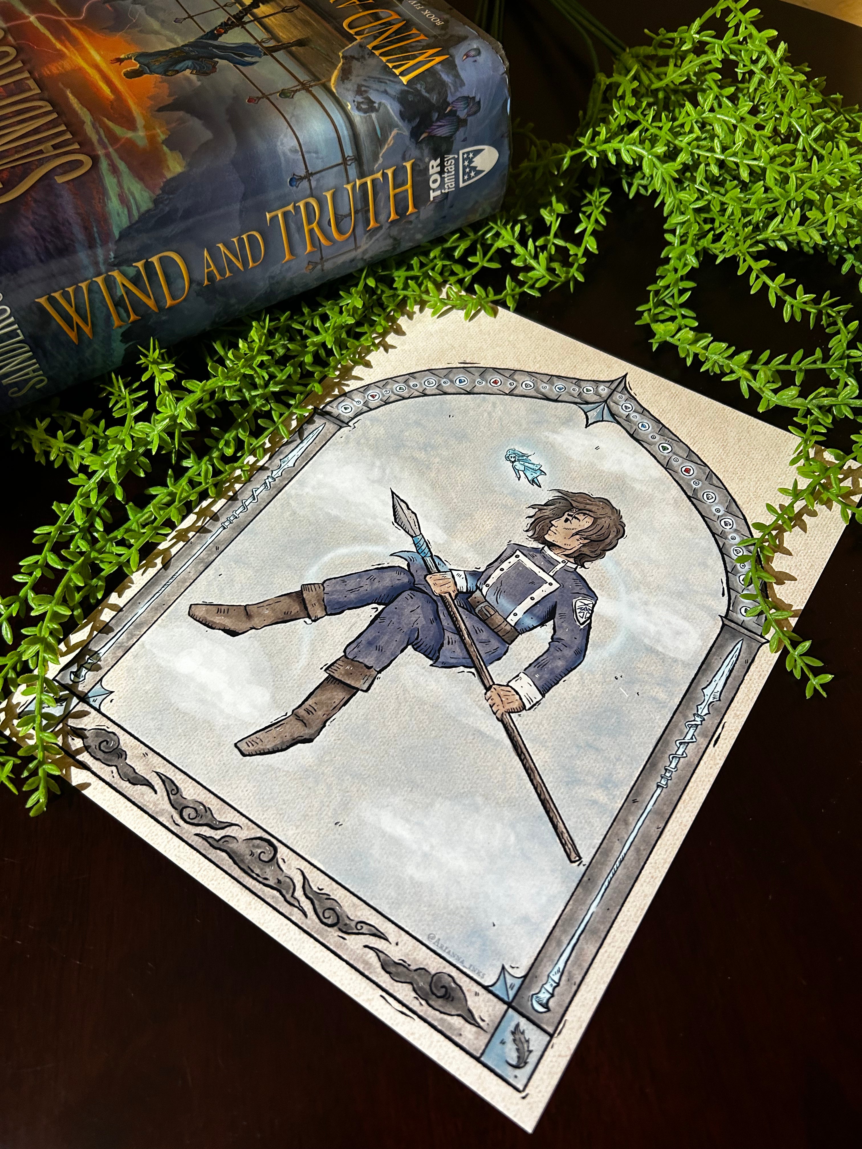Card with a character holding a sword on a surface with greenery and book in the background.