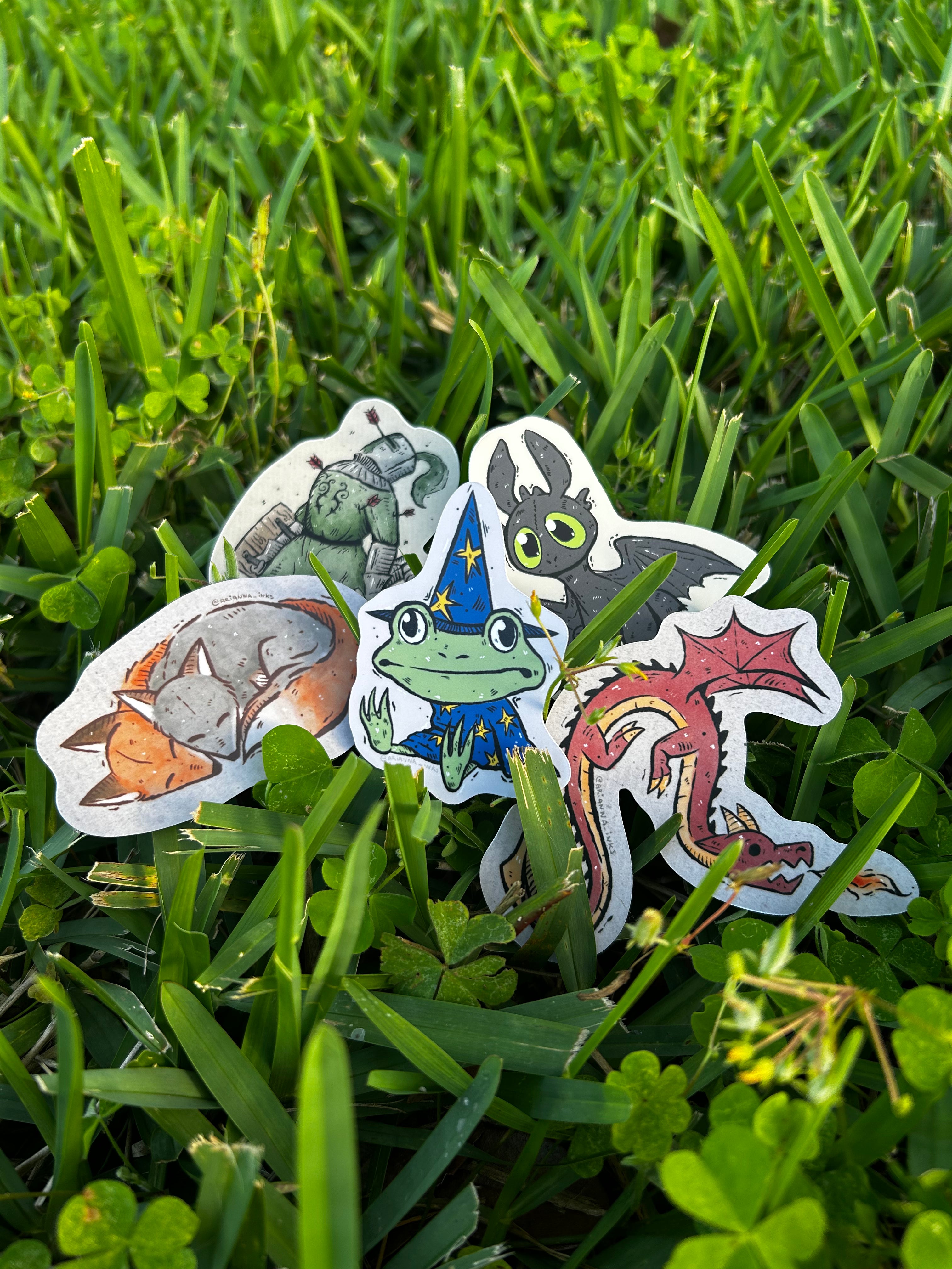 Five of my stickers on grass